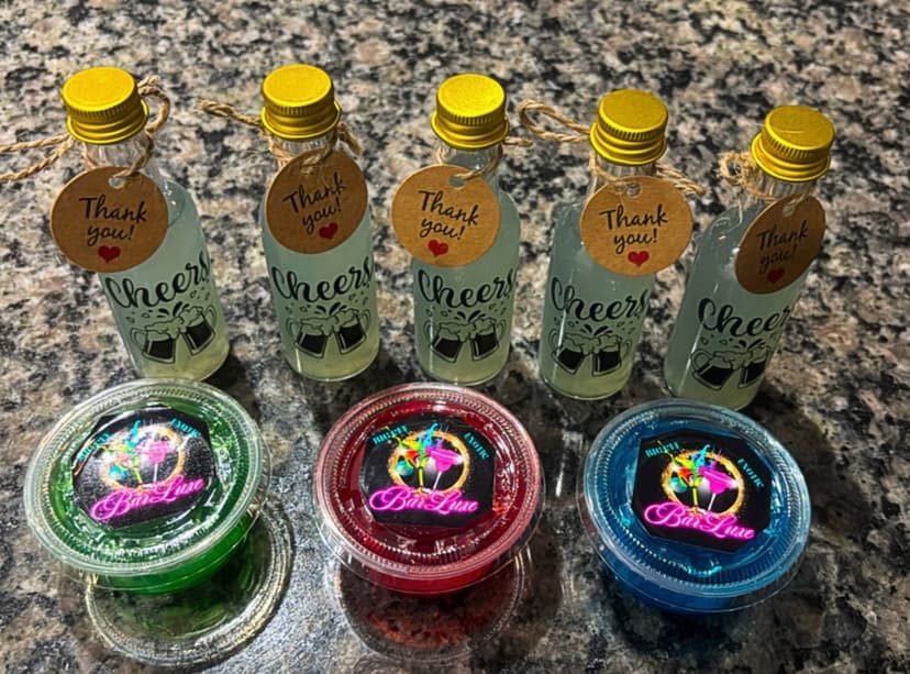 Signature cocktail garnished with edible flowers